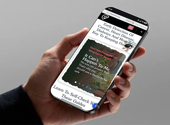 Hand holding a phone showing SelfCheck health content